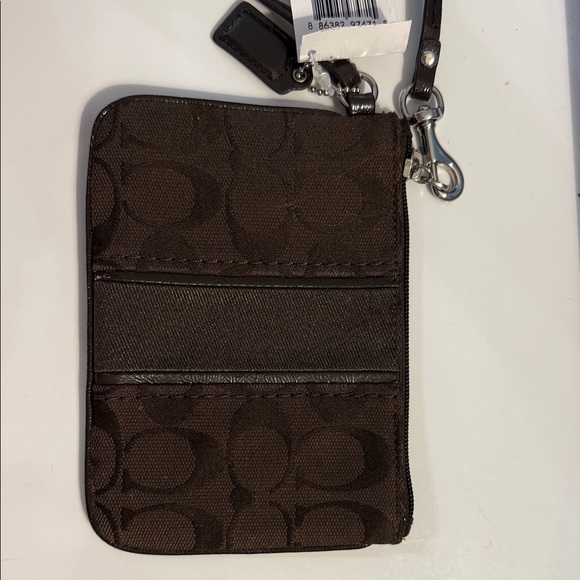Coach Accessories - Coach Brown Wristlet with Logo Pattern